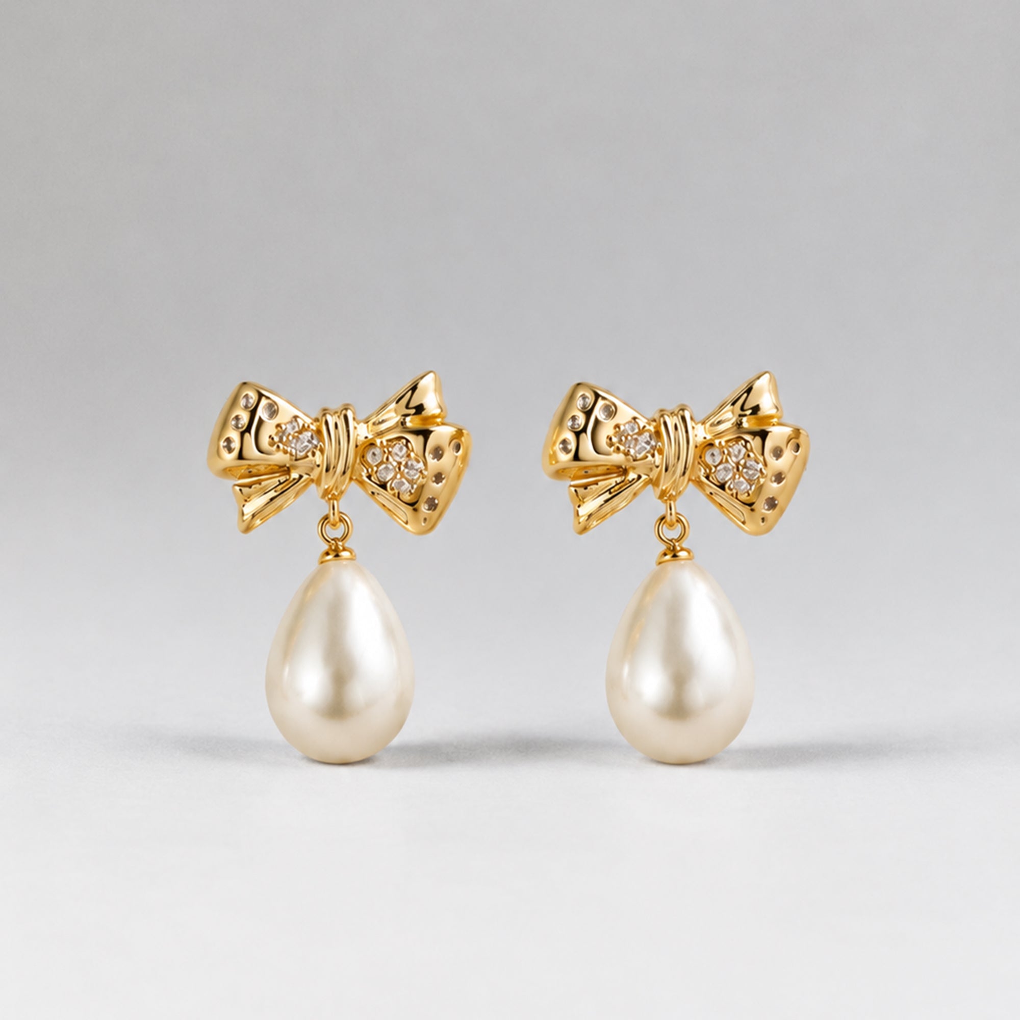 BOW PEARL EARRINGS DROP EARRINGS IN GOLD, CRYSTALS & PEARLS