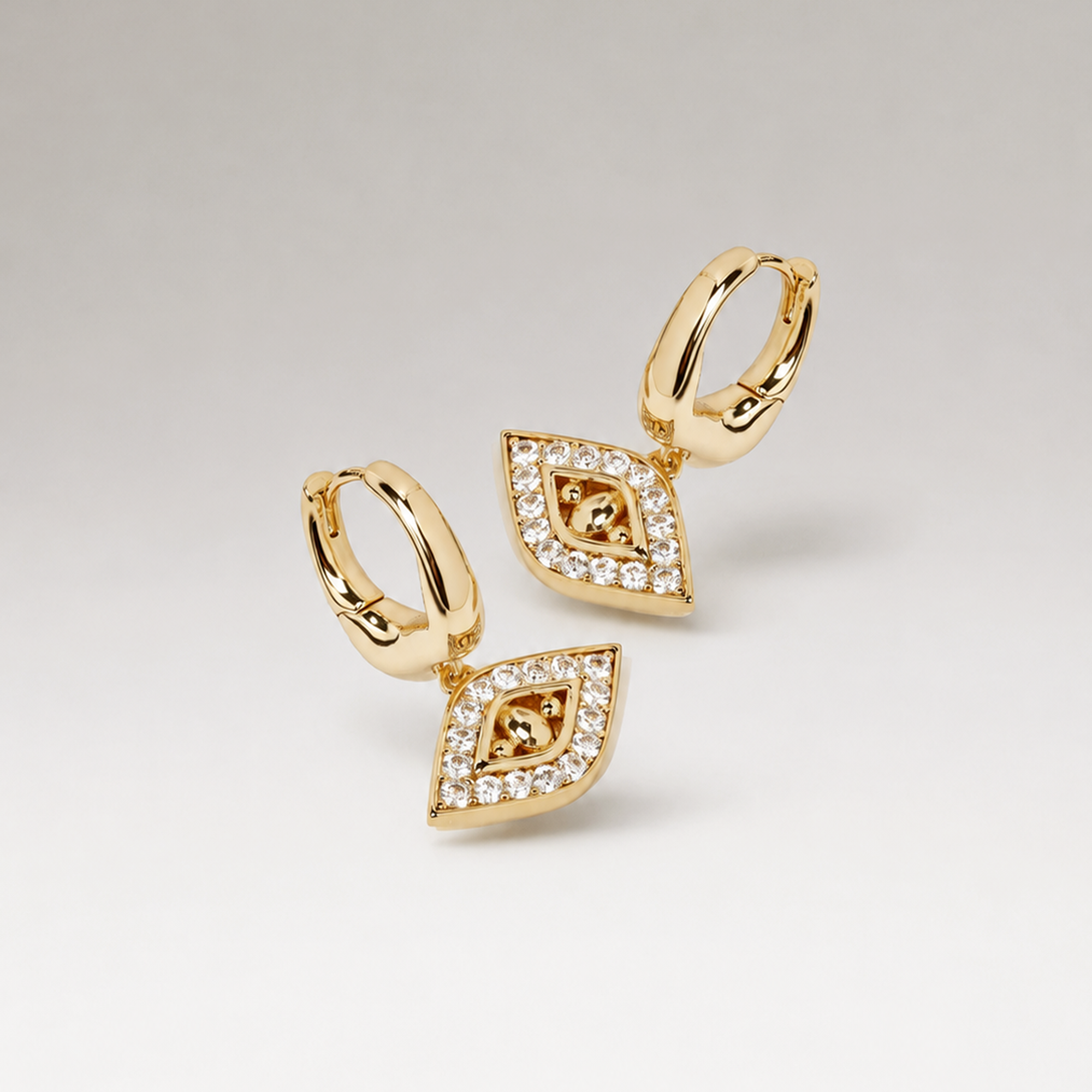 EVIL EYE DROP EARRINGS IN GOLD & CRYSTALS