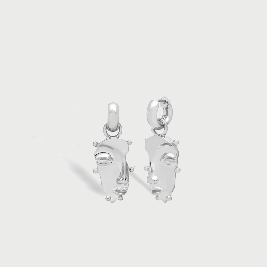 Visage Drop Hoop Earrings in Silver