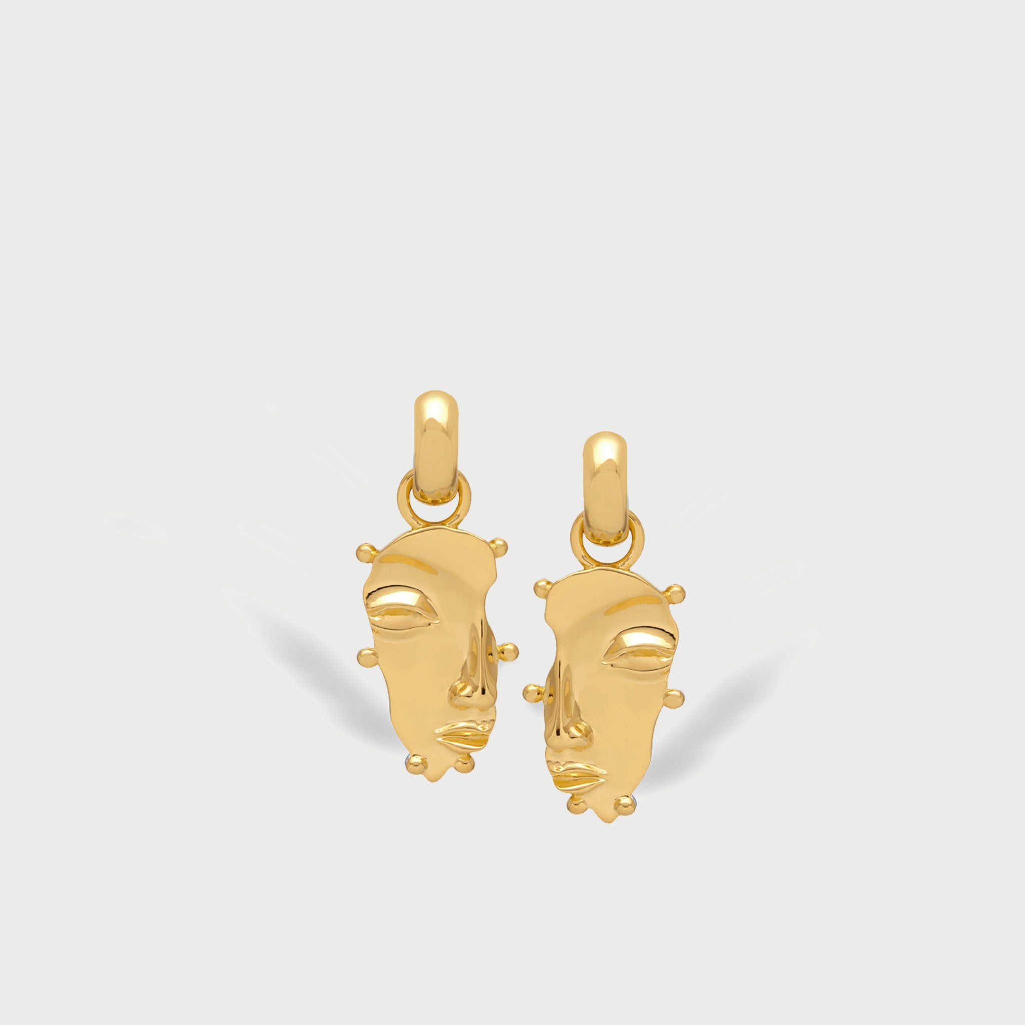 Visage Drop Hoop Earrings in Gold