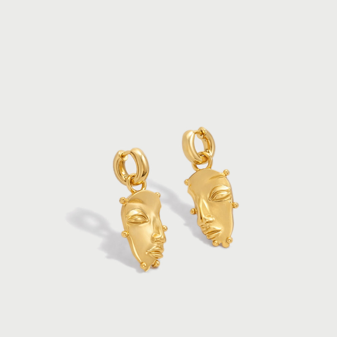 Visage Drop Hoop Earrings in Gold